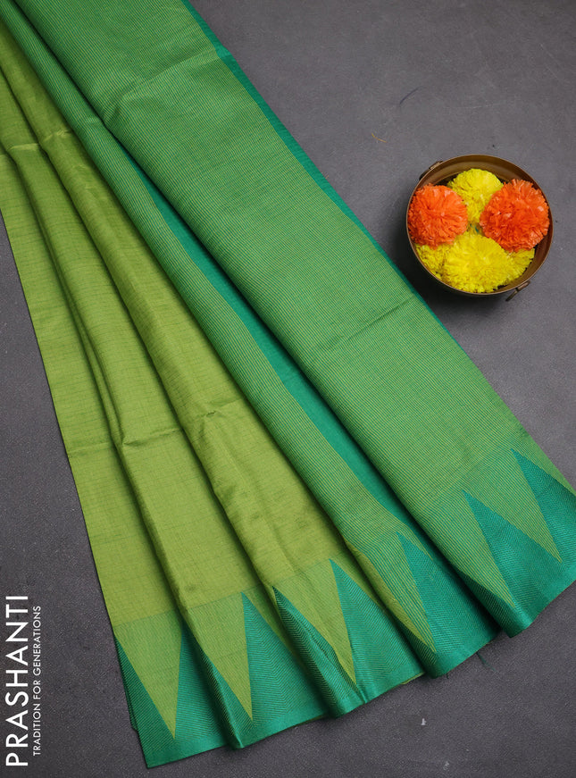 Semi dupion saree light green and teal green with allover thread stripe pattern and temple design thread woven border