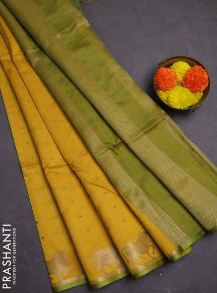 Semi dupion saree mustard yellow and light green with allover bandhani thread woven buttas and pichwai border