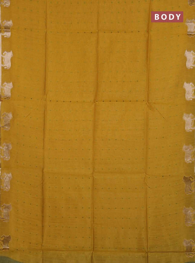 Semi dupion saree mustard yellow and light green with allover bandhani thread woven buttas and pichwai border