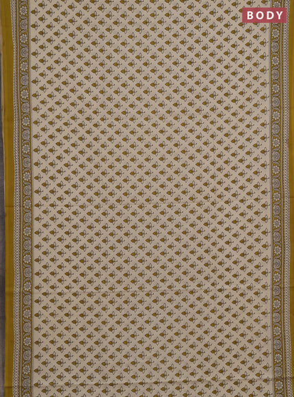 Jaipur cotton saree beige and mustard green with allover butta prints and printed border