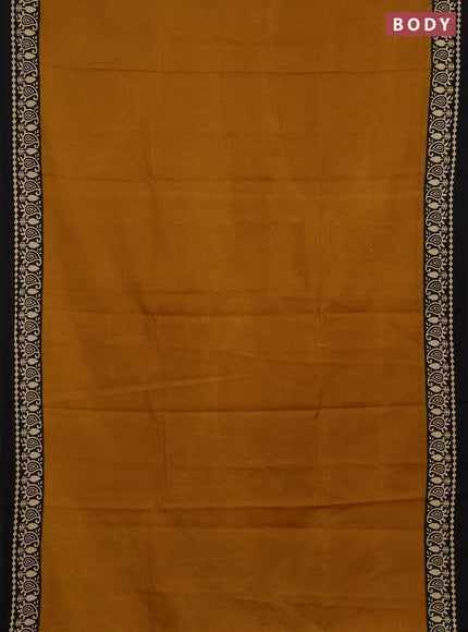 Jaipur cotton saree dark mustard and black with plain body and printed border