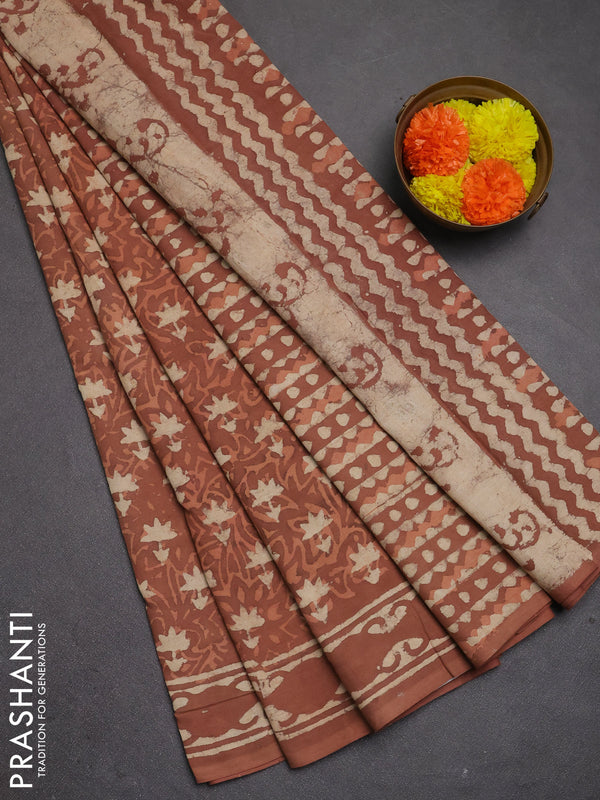 Jaipur cotton saree dark peach with allover dabu prints and printed border