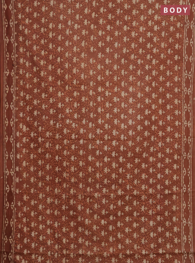 Jaipur cotton saree dark peach with allover dabu prints and printed border