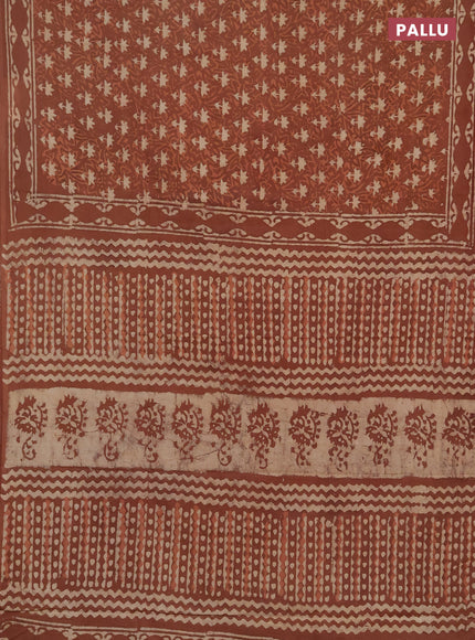 Jaipur cotton saree dark peach with allover dabu prints and printed border