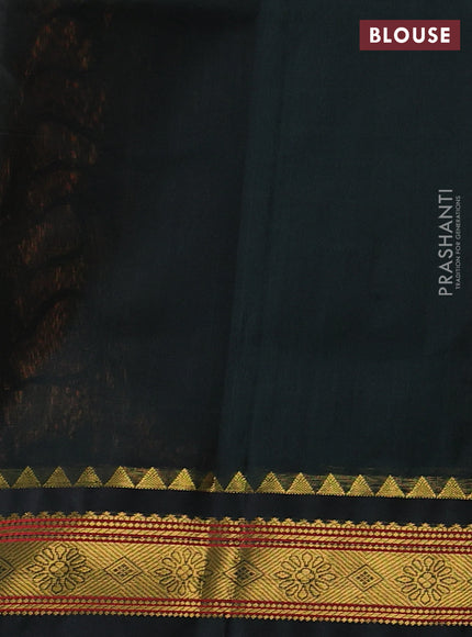 Silk cotton saree dark mustard and bottle green with plain body and zari woven korvai border