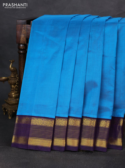 Silk cotton saree cs blue and violet with plain body and zari woven korvai border