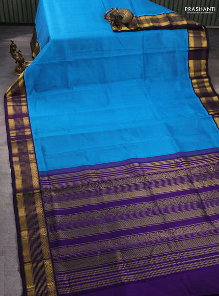 Silk cotton saree cs blue and violet with plain body and zari woven korvai border