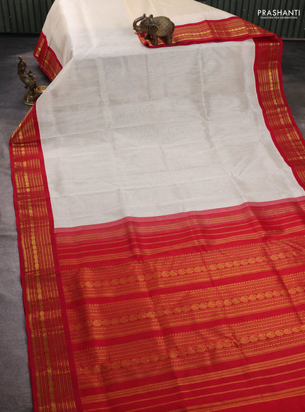 Silk cotton saree off white and red with plain body and zari woven korvai border