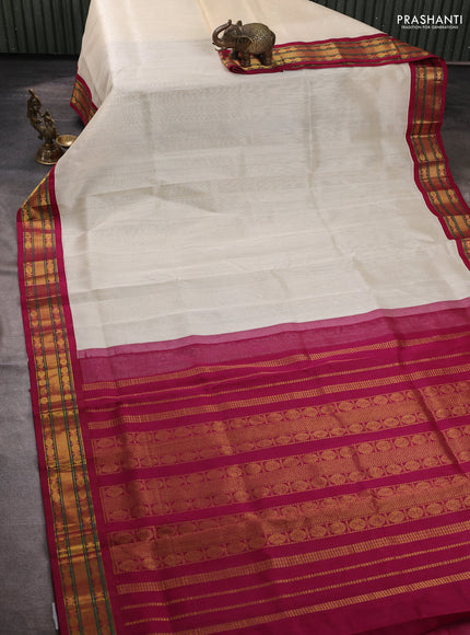 Silk cotton saree off white and wine shade with plain body and zari woven korvai border
