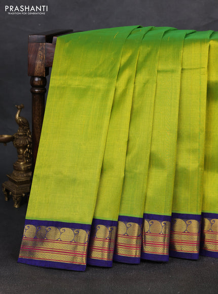 Silk cotton saree light green and blue with plain body and zari woven korvai border