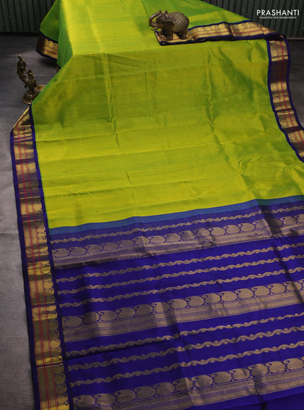 Silk cotton saree light green and blue with plain body and zari woven korvai border