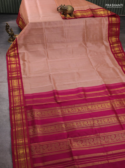 Silk cotton saree dark peach and wine shade with plain body and zari woven korvai border