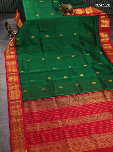 Silk cotton saree bottle green and red with zari woven buttas and zari woven korvai border