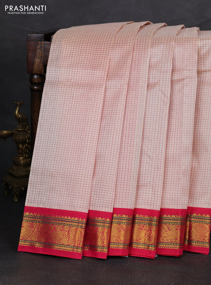 Silk cotton saree cream and pink with allover small checked pattern and zari woven korvai border