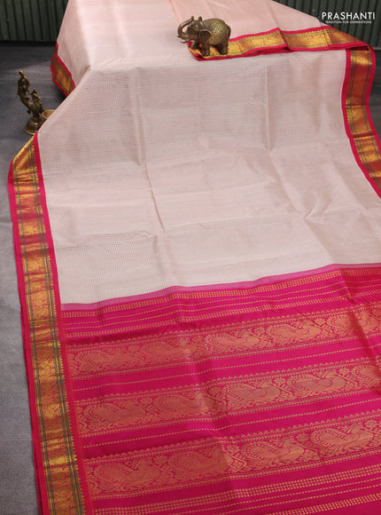 Silk cotton saree cream and pink with allover small checked pattern and zari woven korvai border