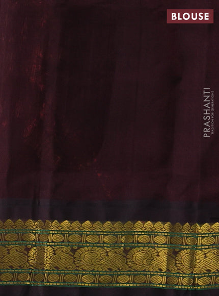 Silk cotton saree dual shade of pinkish orange and black with allover checked pattern and zari woven korvai border