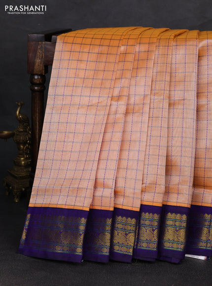 Silk cotton saree pale orange and violet with allover checked pattern and zari woven korvai border