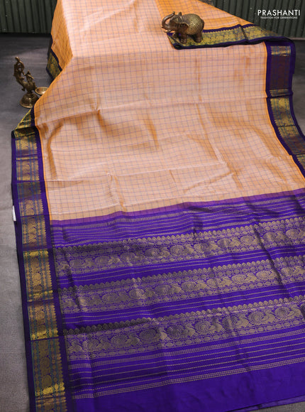 Silk cotton saree pale orange and violet with allover checked pattern and zari woven korvai border