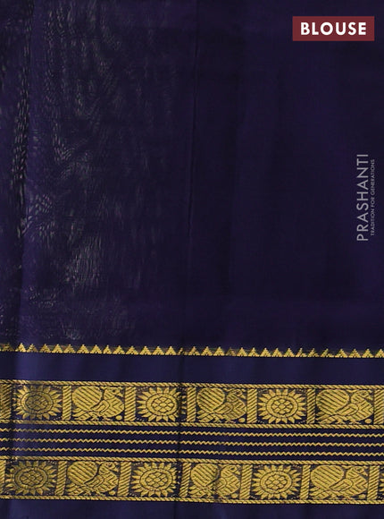 Silk cotton saree mild pista green and navy blue with allover zari checked pattern and zari woven korvai border