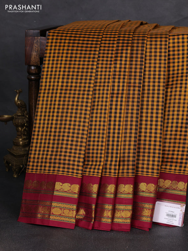 Silk cotton saree mustard yellow and wine shade with allover paalum pazhamum checked pattern and zari woven korvai border
