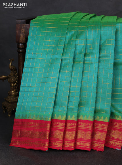 Silk cotton saree teal green and pink with allover zari checked pattern and temple zari woven korvai border
