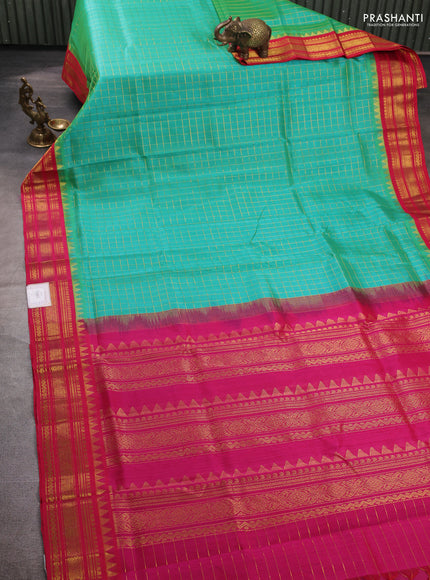 Silk cotton saree teal green and pink with allover zari checked pattern and temple zari woven korvai border