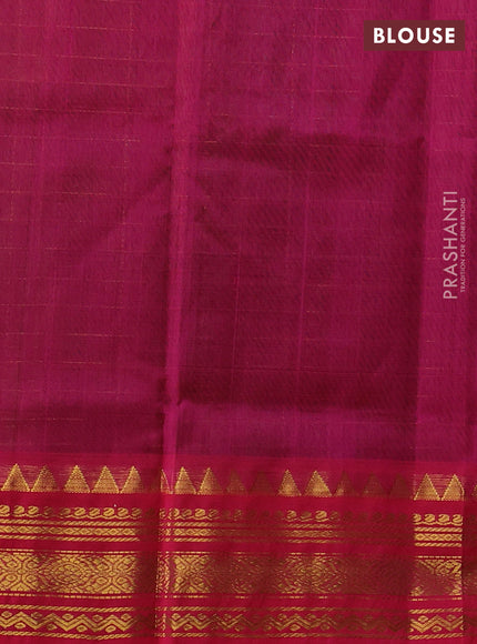 Silk cotton saree bottle green and pink with allover zari checked pattern and temple zari woven korvai border