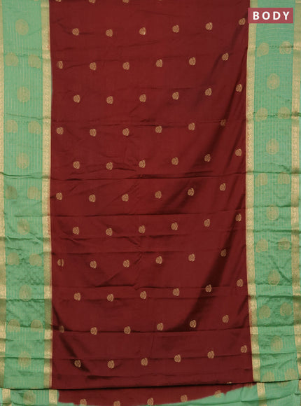 Semi mysore silk saree brown and pastel green with zari woven buttas and long zari woven butta border