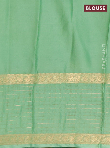 Semi mysore silk saree brown and pastel green with zari woven buttas and long zari woven butta border