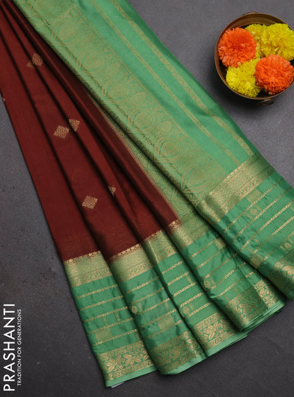 Semi mysore silk saree rust shade and pastel green with zari woven buttas and long zari woven border