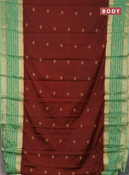 Semi mysore silk saree rust shade and pastel green with zari woven buttas and long zari woven border