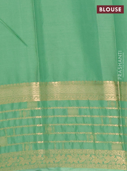 Semi mysore silk saree rust shade and pastel green with zari woven buttas and long zari woven border
