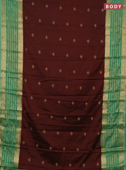Semi mysore silk saree brown and pastel green with zari woven buttas and long zari woven border