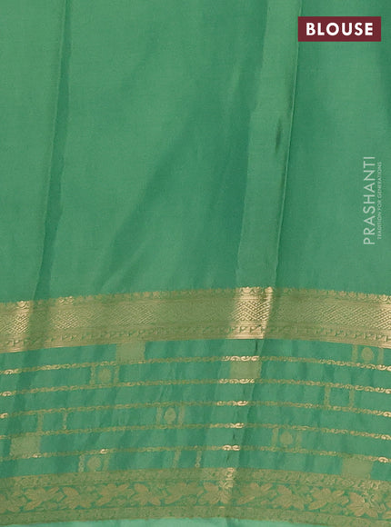 Semi mysore silk saree brown and pastel green with zari woven buttas and long zari woven border