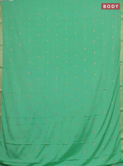 Semi mysore silk saree teal green with allover zari woven buttas and zari woven border