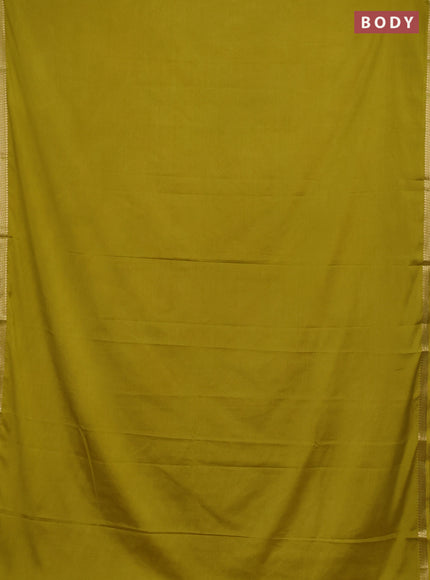 Semi mysore silk saree mustard green with plain body and small zari woven border
