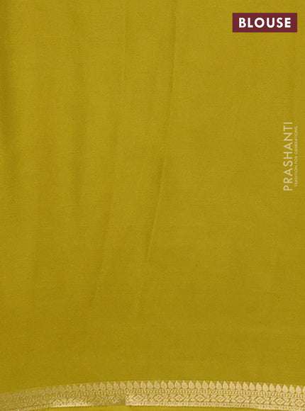 Semi mysore silk saree mustard green with plain body and small zari woven border