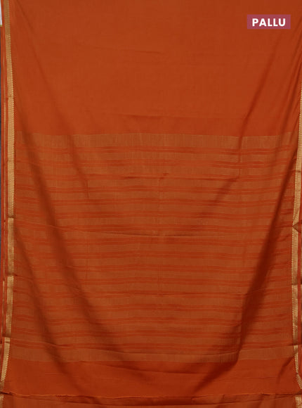 Semi mysore silk saree rust shade with plain body and small zari woven border