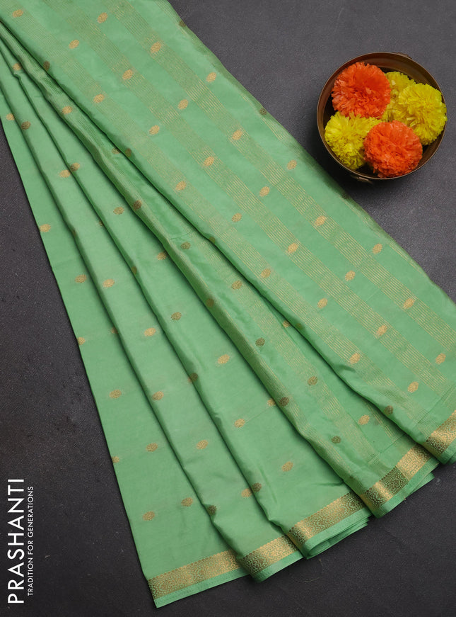 Semi mysore silk saree mild teal green with allover zari woven buttas and small zari woven border