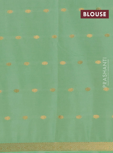 Semi mysore silk saree mild teal green with allover zari woven buttas and small zari woven border