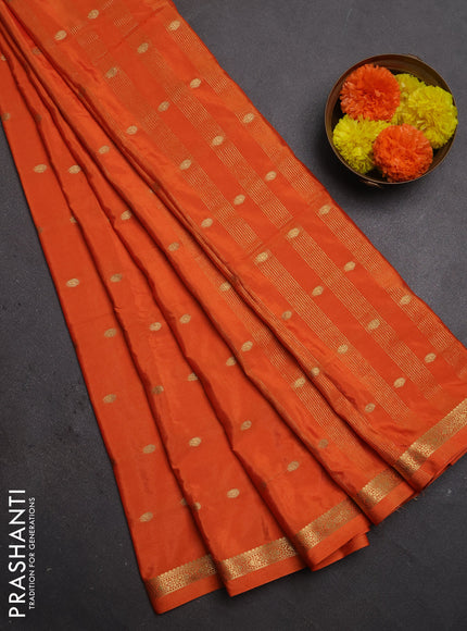 Semi mysore silk saree orange with allover zari woven buttas and small zari woven border