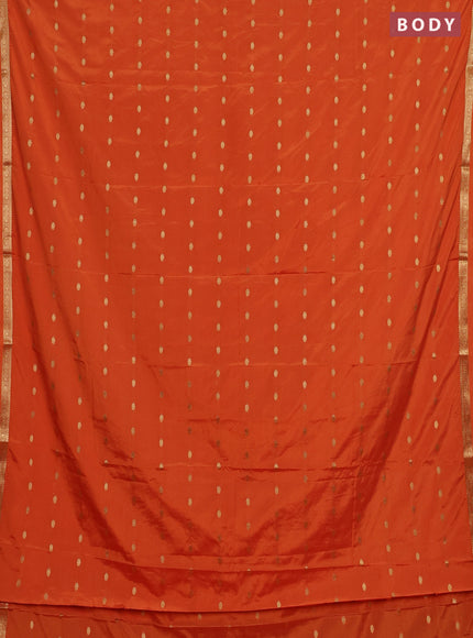 Semi mysore silk saree orange with allover zari woven buttas and small zari woven border