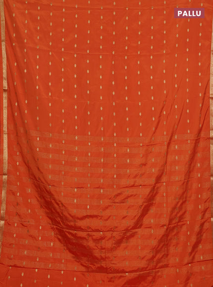 Semi mysore silk saree orange with allover zari woven buttas and small zari woven border
