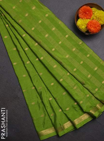 Semi mysore silk saree light green with allover zari woven buttas and small zari woven border