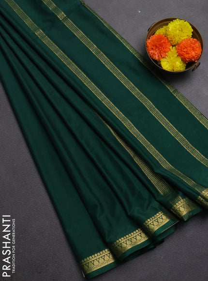 Semi mysore silk saree green with plain body and small zari woven border