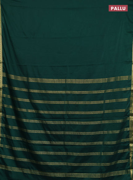 Semi mysore silk saree green with plain body and small zari woven border