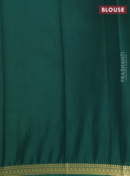 Semi mysore silk saree green with plain body and small zari woven border