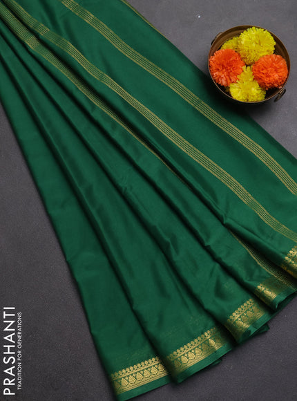 Semi mysore silk saree light green with plain body and small zari woven border