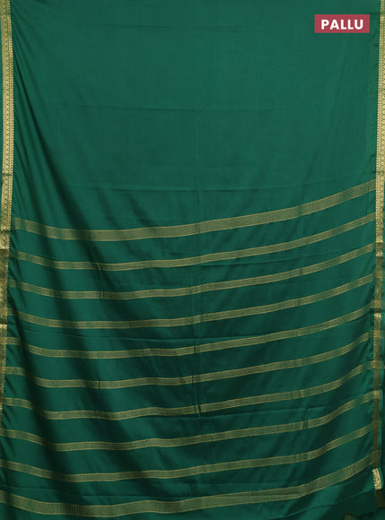 Semi mysore silk saree light green with plain body and small zari woven border