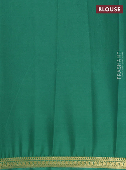 Semi mysore silk saree light green with plain body and small zari woven border